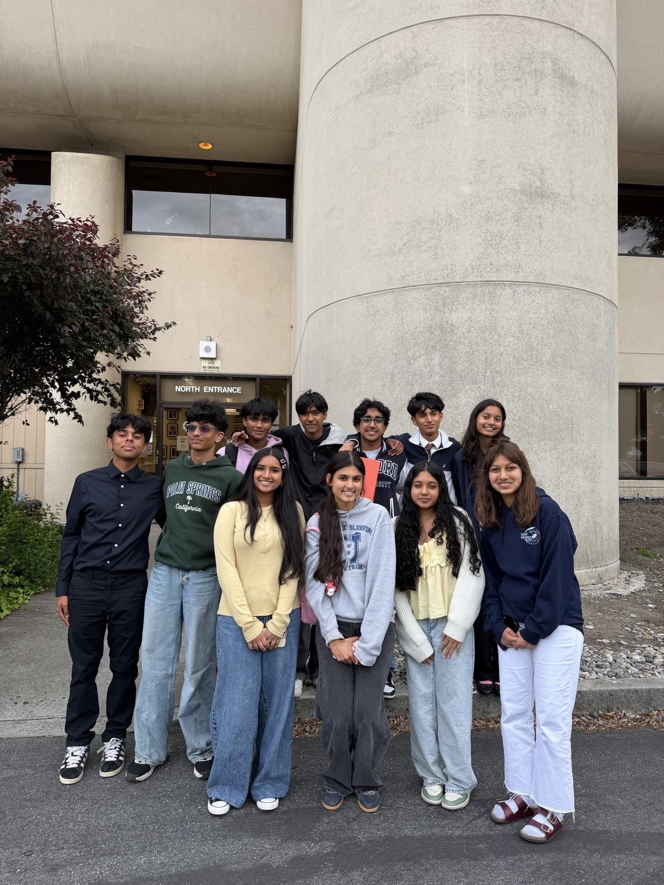 Fremont Youth Vote members outside a school building